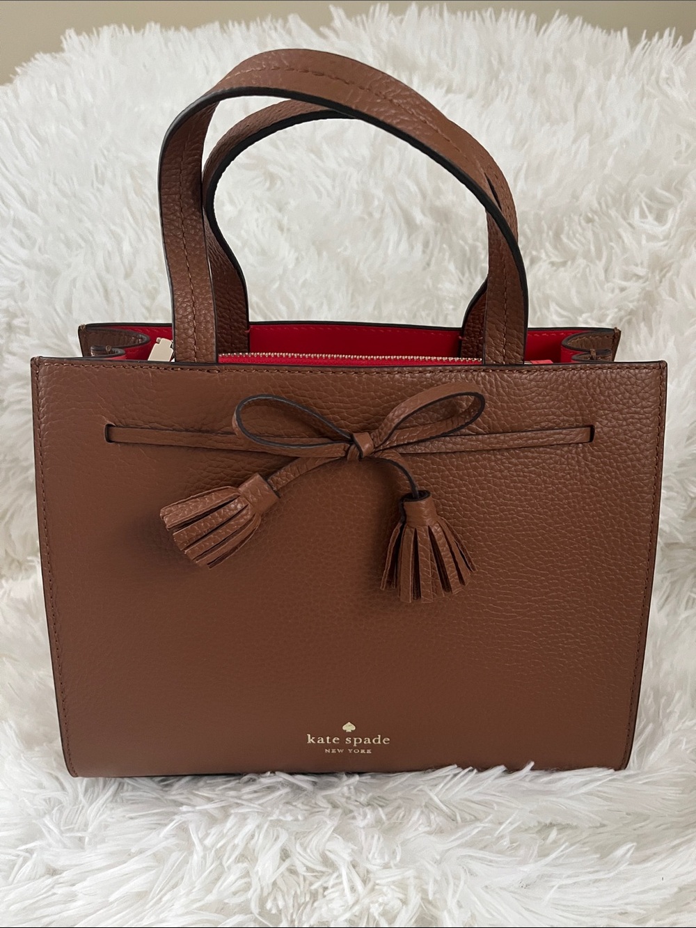 kate spade brown pebble leather satchel with tassel bow